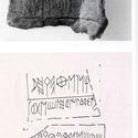 Plaqueta de plom amb inscripció d’alfabet ibèric a dues cares.  Exposada a una sala del Museu Nacional d’Arqueologia de Catalunya de Barcelona. 
