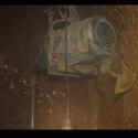 Fotografies fetes l’abril de 1991 de l’interior del pou situat sota de l’estructura del molí de vent.   